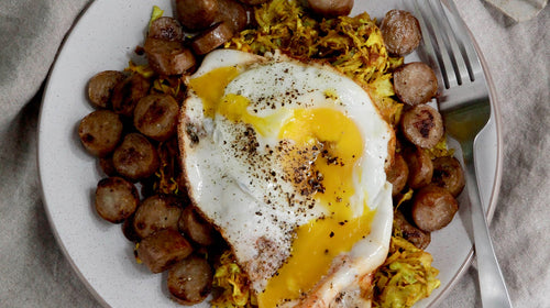 Keto Turmeric Cabbage & Sausage with Fried Egg